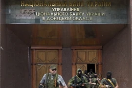 Đức-Pháp cùng dọa sẽ có biện pháp trừng phạt mới với Nga