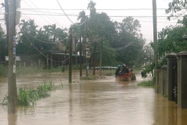 Cảnh ngập lụt ở huyện Mộ Đức, Quảng Ngãi. (Ảnh: Phước Ngọc/TTXVN)