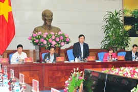 Phó Thủ tướng, Bộ trưởng Ngoại giao Phạm Bình Minh, Chủ tịch Ủy ban quốc gia APEC 2017 chủ trì một phiên họp của Ủy ban Quốc gia APEC 2017. (Ảnh: Nguyễn Khang/TTXVN)