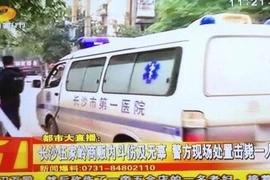 Đài truyền hình Hồ Nam đưa tin về vụ chém giết này. (Nguồn: 163.com)