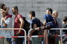Người di cư tại nhà ga ở Munich, miền Nam nước Đức ngày 1/9. (Nguồn: AFP/TTXVN)