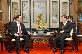 Chủ tịch nước Trần Đại Quang gặp Ủy viên Thường vụ Bộ Chính trị Trung ương Đảng Cộng sản Trung Quốc Lưu Vân Sơn. (Ảnh: Nhan Sáng/TTXVN)