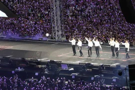 Các thành viên nhóm nhạc BTS biểu diễn tại Busan, Hàn Quốc, ngày 16/6/2019. (Nguồn: Yonhap/TTXVN) 