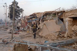 Hiện trường một vụ nổ bom ở Afghanistan. (Nguồn: AFP/TTXVN)