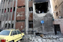 Hiện trường một vụ đánh bom ở Damascus. (Nguồn: AFP)