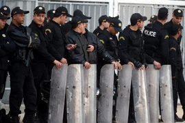 Cảnh sát chống bạo động Tunisia. (Nguồn: AFP/TTXVN)