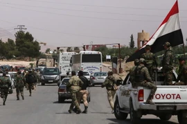Các lực lượng Syria tăng cường an ninh tại Damacus ngày 9/4. (Nguồn: AFP/TTXVN)