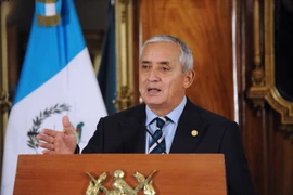 Tổng thống Guatemala Otto Perez Molina phát biểu trong cuộc họp báo tại Guatemala City ngày 21/5. (Nguồn: AFP/TTXVN)