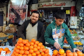 Người dân Syria được trở lại hoạt động thường nhật hàng ngày tại Damascus ngày 27/2, sau khi lệnh ngừng bắn có hiệu lực. (Nguồn: THX/TTXVN)