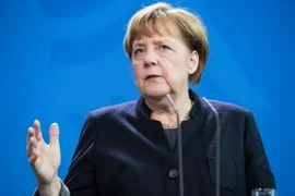 Thủ tướng Đức Angela Merkel phát biểu tại cuộc họp báo ở Berlin ngày 23/2. (Nguồn: AFP/TTXVN)