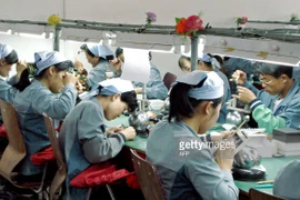 Công nhân làm việc trong nhà máy ở Kaesong. (Nguồn: AFP/Getty Images) 