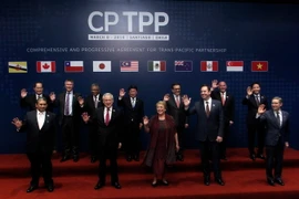 Đại diện các nước tại lễ ký thỏa thuận CPTPP ở Santiago, Chile ngày 8/3. (Nguồn: AFP/TTXVN)