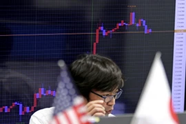 Biểu đồ dao động tỷ giá đồng yen Nhật so với đồng USD tại thủ đô Tokyo, Nhật Bản. (Nguồn: AP/TTXVN)