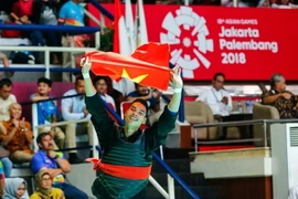 Võ sỹ Trần Đình Nam giành huy chương vàng môn Pencak Silat. (Ảnh: Trọng Tuệ-Phúc Hưng/TTXVN) 