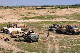 Binh sỹ Afghanistan trong chiến dịch truy quét phiến quân tại tỉnh Jowzjan, miền bắc Afghanistan ngày 12/4. (Nguồn: THX/TTXVN)