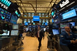Giao dịch viên tại Sàn giao dịch chứng khoán New York, Mỹ ngày 14/9. (Nguồn: AFP/TTXVN)