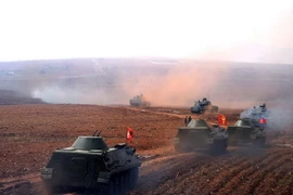 Quân đội Triều Tiên tập trận tại một địa điểm bí mật. (Nguồn: AFP/TTXVN)