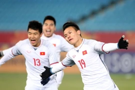 Niềm vui của các cầu thủ U23 Việt Nam sau khi san bằng tỷ số 2-2 trong trận gặp U23 Qatar. (Ảnh: Hoàng Linh/TTXVN)