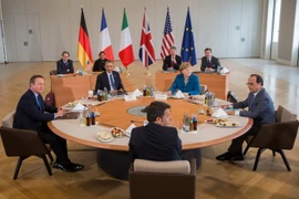 Thủ tướng Đức Angela Merkel hội đàm với Tổng thống Mỹ và Pháp cùng Thủ tướng Anh và Italy. (Nguồn: EPA/TTXVN)