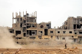 Cảnh đổ nát sau các cuộc xung đột ở Damascus, Syria ngày 22/5. (Nguồn: THX/TTXVN) 