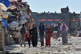 Người dân Syria. (Nguồn: AFP/TTXVN) 