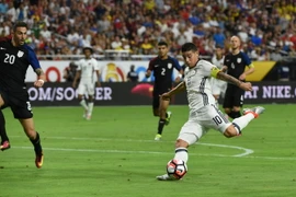 Tiền vệ Colombia James Rodriguez (số 10). (Nguồn: AFP/TTXVN)