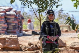 Các thành viên FARC tại San José de Oriente, Colombia, ngày 1/2. (Nguồn: AFP/TTXVN)