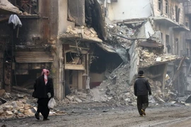 Cảnh đổ nát sau những đợt không kích ở thị trấn al-Bab ngày 18/1. (Nguồn: AFP/TTXVN)