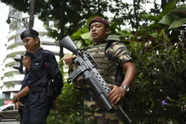 Cảnh sát Malaysia tăng cường an ninh tại thủ đô Kuala Lumpur. (Nguồn: AFP/TTXVN)