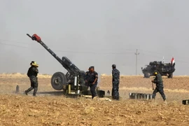 Lực lượng Chính phủ Iraq nã đạn pháo vào các mục tiêu của dân quân người Kurd ở Faysh Khabur thuộc Khu tự trị người Kurd ngày 26/10. (Nguồn: AFP/TTXVN)