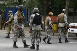 Lực lượng an ninh Afghanistan phong tỏa hiện trường một vụ tấn công của Taliban tại Kabul. (Nguồn: AFP/TTXVN) 