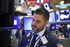 Giao dịch viên tại Sàn giao dịch chứng khoán New York, Mỹ, ngày 13/5/2019. (Nguồn: THX/TTXVN) 