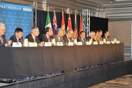 Bộ trưởng Thương mại các nước tham gia đàm phán TPP trong một họp báo chung. (Ảnh: Thanh Tuấn/TTXVN)