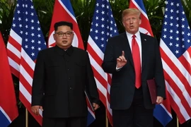 Nhà lãnh đạo Triều Tiên Kim Jong-un và Tổng thống Mỹ Donald Trump. (Nguồn: TTXVN)