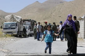 Người tị nạn Syria chuẩn bị hồi hương từ Liban ngày 28/6. (Nguồn: AFP/TTXVN)
