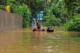 Cảnh ngập lụt tại Ernakulam, bang Kerala, Ấn Độ, ngày 9/8. (Nguồn: AFP/TTXVN) 