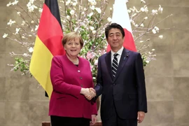 Thủ tướng Đức Angela Merkel và người đồng cấp Nhật Bản Shinzo Abe. (Nguồn: AP) 