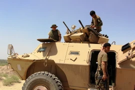 Lực lượng an ninh Afghanistan tham gia chiến dịch truy quét Taliban ở tỉnh Kunduz ngày 19/7. (Nguồn: THX/TTXVN)