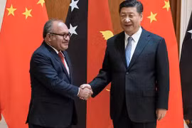 Thủ tướng Papua New Guinea Peter O'Neill (trái) và Chủ tịch Trung Quốc Tập Cận Bình. (Nguồn: Reuters) 