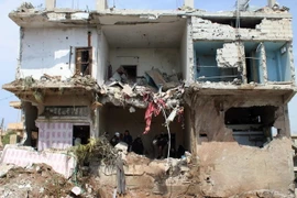 Một ngôi nhà bị phá hủy trong cuộc không kích ở Daraa, Syria, ngày 8/4. (Nguồn: AFP/TTXVN)