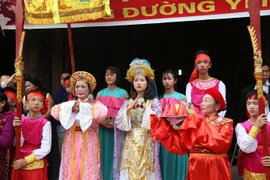 Nhân vật "nữ tướng Lê Hoa" trong lễ hội Kén rể năm nay. (Ảnh: Bùi Lan/Vietnam+)