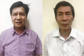 Bị can Trần Ngọc Hà, nguyên Chủ tịch Hội đồng quản trị, nguyên Tổng Giám đốc VEAM (trái) và bị can Lâm Chí Quang, nguyên Tổng Giám đốc VEAM. (Nguồn: TTXVN phát)