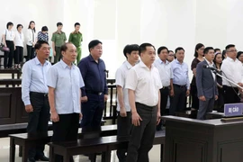 Các bị cáo tại phiên tòa. (Ảnh: Văn Điệp/TTXVN)