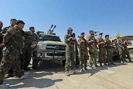 Ảnh tư liệu: Các tay súng người Kurd tại thị trấn Shadadi, cách thành phố Hassakeh ở đông bắc Syria 60km, ngày 11/9/2018. (Nguồn: AFP/TTXVN)