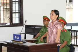 Bị cáo Đàng Chi Uyên tại phiên xét xử. (Ảnh: Nguyễn Thành/TTXVN)