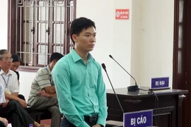 Bị cáo Hoàng Công Lương tại tòa. (Ảnh: Thanh Hải/TTXVN)