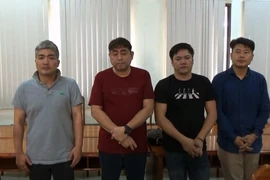Các đối tượng người Hàn Quốc cầm đầu sòng bạc. (Nguồn: TTXVN phát)