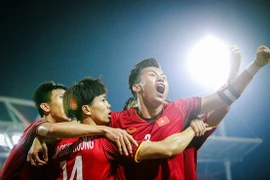 Tuyển thủ Quế Ngọc Hải và đồng đội ăn mừng chiến thắng tại AFF Suzuki Cup 2018. (Ảnh: Trọng Đạt//TTXVN)