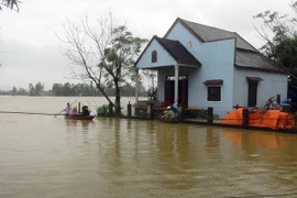 Mưa lũ khiến nhiều khu vực ở Quảng Nam ngập sâu. (Ảnh: Đỗ Trưởng/TTXVN)