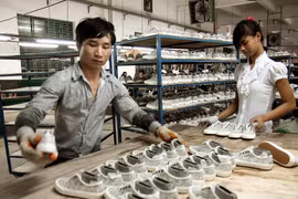 Kế hoạch cơ cấu lại nền kinh tế giai đoạn 2021-2025 được xây dựng trong bối cảnh dịch bệnh COVID-19 diễn biến phức tạp, gây ra nhiều tác động nặng nề cho nền kinh tế. (Ảnh: TTXVN)